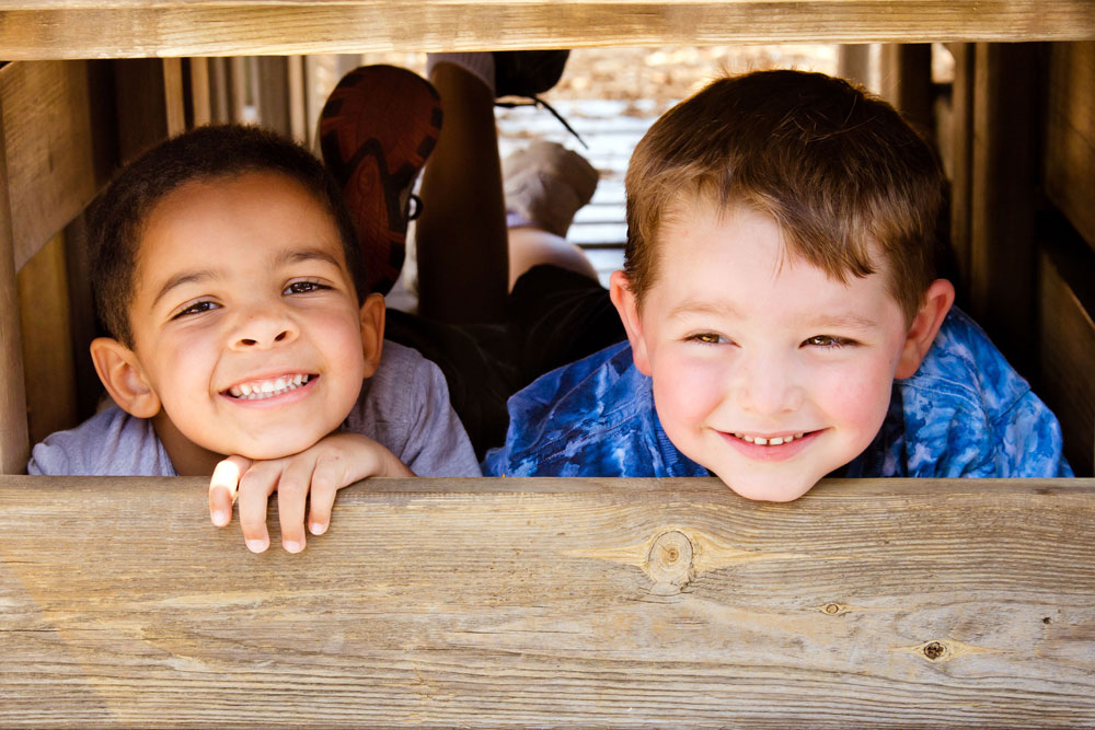 Two children in outside play area